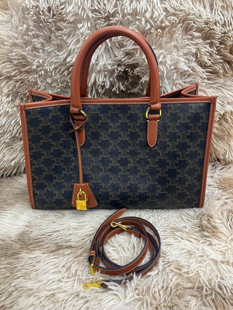 Sale‼️Preloved Celine Triomphe Tote (Category: Tote Bags) located in Manila. Submitted by bagsandshoesmanymore (Listing ID 1468222462, Image 1). Description: Preloved Celine Triomphe Size 34cm What you see is what you get Japan source🇯🇵 Please read before you order 👉🏻❗️Payment first before shipping ❗️Cut off time of payment 11am sameday delivery ❗️NO MEET UP / NO PICK UP ❗️ORDER CANNOT BE CANCELLED ❗️PLEASE DON’T BUY IF YOU ARE IN DOUBT ❗️NO 