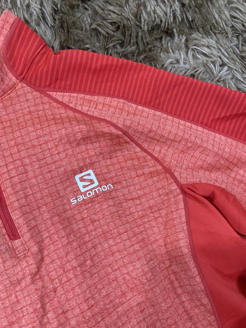 Salomon AdvancedSkin ActiveDry Red 1/4 Zip Pullover Size 90 (Category: Coats, Jackets and Outerwear) located in Cagayan de Oro. Submitted by sepamorash53558 (Listing ID 1468265578, Image 2). Description: - Brand: Salomon (Mountain Sports Progression) - Style: 1/4 Zip Active Top - Color: Coral red with contrast ribbed shoulder/side panels - Size: Tagged 90 (Fits Small) - Features: Grid fleece interior for warmth, AdvancedSkin ActiveDry tech to wic