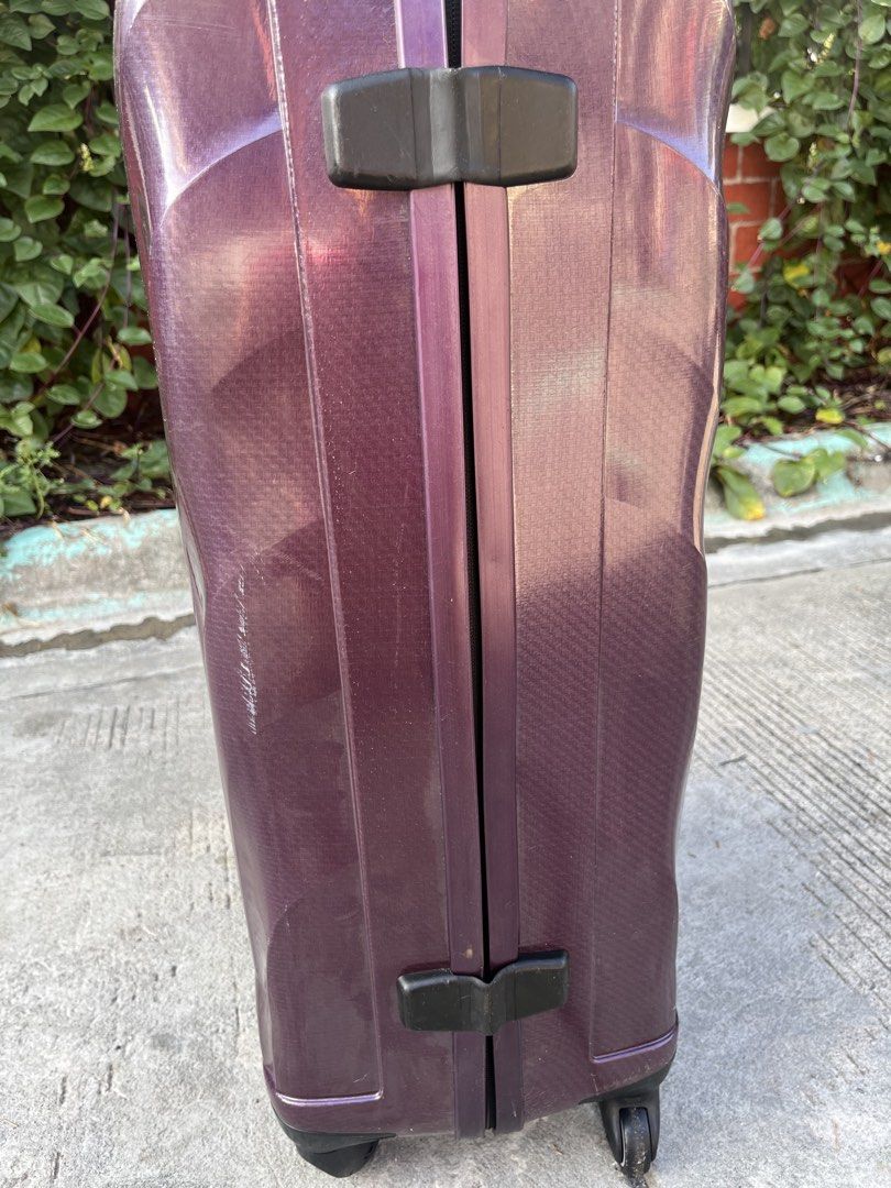 Samsonite Curv Purple Spinner Suitcase Luggage (Category: Luggage) located in Manila. Submitted by batusaipus03057 (Listing ID 1468075474, Image 3). Description: ❤️New Arrival Samsonite Cosmolite Spinner♥️ Suitcase in the Violet/Aubergine colorway. Key Details & Specifications: • Shell Design: Features an iconic, nature-inspired curved fishbone shell pattern (modeled after a seashell) engineered to distribute impacts and prevent denting. • Materi