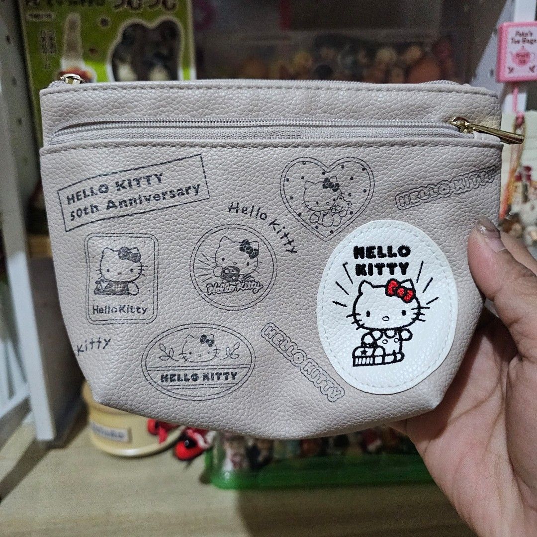 Sanrio Hello Kitty Gray Pouch (Category: Character Goods) located in Manila. Submitted by lovelylovesjapan (Listing ID 1468206740, Image 1). Description: 🌸The item is on-hand and authentic from Japan 🌸Mode of Payment (MOP): GCASH/Bank Transfer 🌸Mode of Delivery (MOD): J&T or Lalamove (Shipping every Saturdays and Sundays) Notes: 🩷Breakable items are packed with care and caution. Seller will not be held liable for any damages incurred by the c
