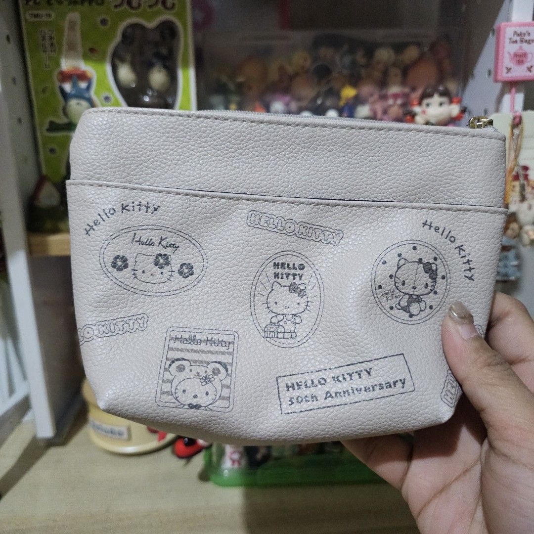 Sanrio Hello Kitty Gray Pouch (Category: Character Goods) located in Manila. Submitted by lovelylovesjapan (Listing ID 1468206740, Image 2). Description: 🌸The item is on-hand and authentic from Japan 🌸Mode of Payment (MOP): GCASH/Bank Transfer 🌸Mode of Delivery (MOD): J&T or Lalamove (Shipping every Saturdays and Sundays) Notes: 🩷Breakable items are packed with care and caution. Seller will not be held liable for any damages incurred by the c