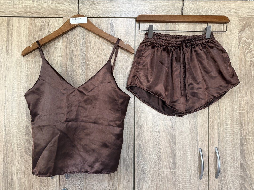 Satin Top & Shorts Set (Category: Undergarments & Loungewear) located in Bulacan. Submitted by relove.re (Listing ID 1468084217, Image 1). Description: FOR SALE | Satin Top & Shorts Set - new never used - size xs bottom - size m top Chic and comfy satin coordinates in a gorgeous chocolate brown! ✨ Perfect for lounging, staycations, or a casual chic look. 🤎 Spaghetti strap V-neck top 🤎 Matching elastic-waist shorts 🤎 Lightweight, silky-looking 