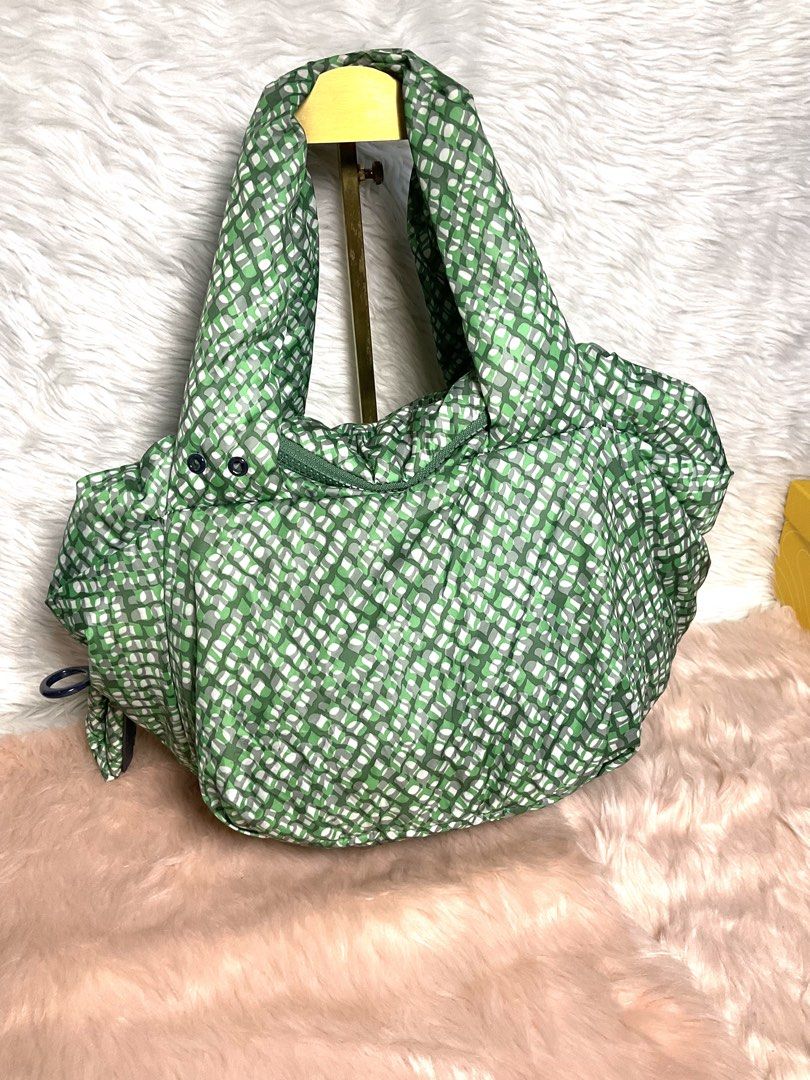 See By Chloe Green Geometric Pattern Tote Bag (Category: Tote Bags) located in La Trinidad. Submitted by naravincollections (Listing ID 1468070774, Image 2). Description: Green geometric pattern handbag from See By Chloe. Puffed nylon body with sturdy top handles. Black fabric lining inside, includes a zippered pocket and brand tag patch. Chunky zip closure with a blue branded pull tab. Clean interior, tag booklet included. Flaws: like new sana i