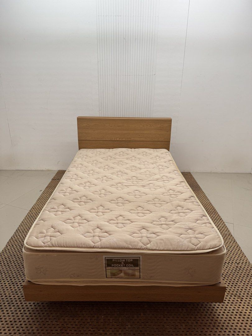 Semi double Bedset (Category: Bed Frames & Mattresses) located in Quezon City. Submitted by matetdevis13 (Listing ID 1468225844, Image 2). Description: Wooden Semi Double Bed Set with Robe Pillow Top and Pocket Coil Mattress Price: 13,500 Frame: 48 x 79 x 35/9 Mattress: 48 x 77 x 10.5 In good condition Code MJS66-MJ415.