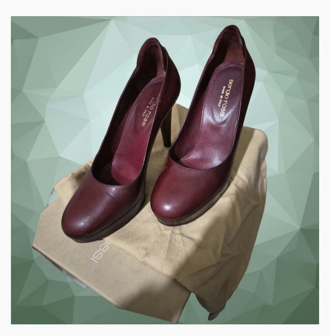 Sergio Rossi Burgundy Leather Platform Pumps (Category: Heels) located in Paranaque City. Submitted by calm_youngstore7 (Listing ID 1468238262, Image 2). Description: Sergio Rossi pumps in rich burgundy leather. Classic rounded toe design paired with a sturdy platform and high heel. Made in Italy. Original dust bag and box included. Beautiful deep color for evening wear or office outfits. PHP 41,500 on tag USED ONCE..