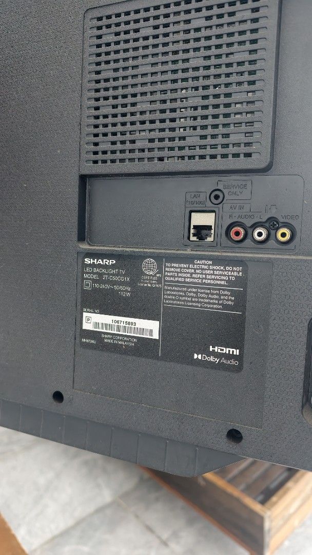 Sharp Aquos 2T-C50CG1X LED Backlight TV (Category: TV) located in Pasay City. Submitted by rin26_cy (Listing ID 1468140917, Image 2). Description: - Brand/Model: Sharp LED TV (Model: 2T-C50CG1X, S/N: 106715893) - Screen Size: 50 inches - Audio/Ports: Dolby Audio, HDMI, LAN, and AV input - Power: 110-240V - Origin: Made in Malaysia - Condition: Excellent, protective plastic film still on the top edge - Mounting: Currently wall-mounted 3pcs availab