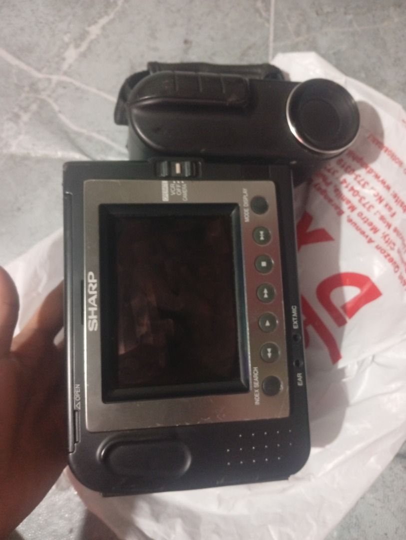 Sharp Viewcam 8 Liquid Crystal Video Camera VL-E8 (Category: Video Cameras) located in Caloocan City. Submitted by wildgem.3835b2 (Listing ID 1468270915, Image 1). Description: - Vintage Sharp Viewcam 8 liquid crystal video camera (Model: VL-E8) - Made in Japan with -fi monaural sound recording - Features a built-in LCD screen and convenient top hand strap - Classic tape-based setup ideal for retro tech collectors and analog videographers.