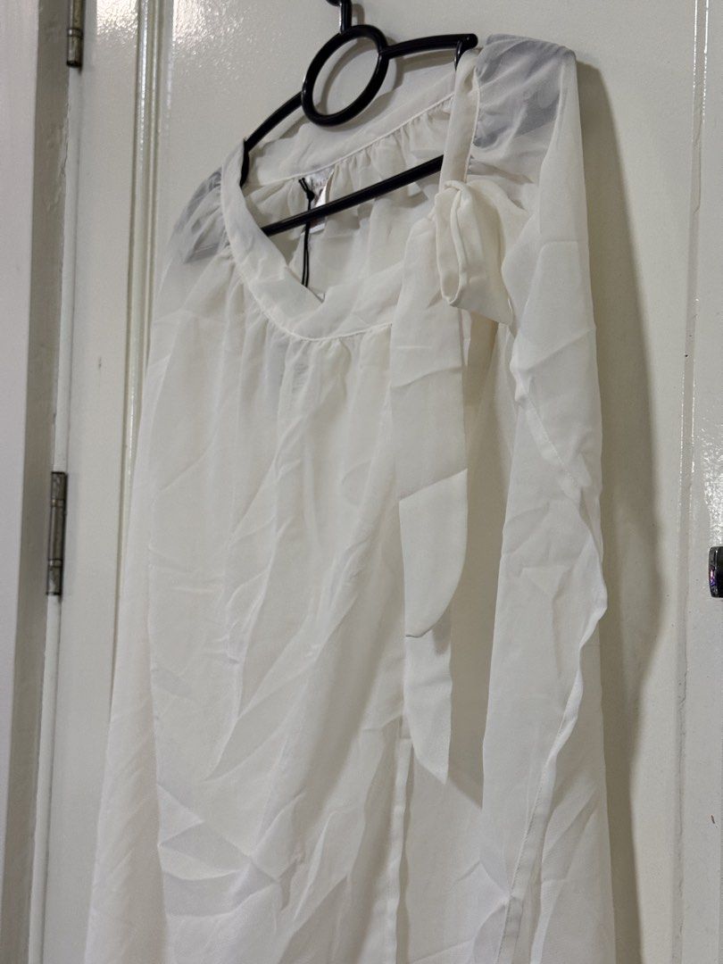 Sheer White Beach Cover up Size S (Category: Skirts) located in Marikina City. Submitted by punch.studioph (Listing ID 1468103761, Image 2). Description: Sheer White Beach Cover Up Size S.