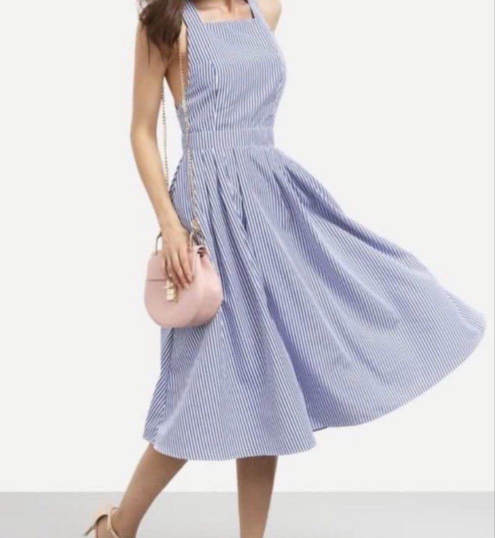 Shein Blue Stripe Backless Maxi Dress (Category: Dresses) located in Binan City. Submitted by myprelovedhaul (Listing ID 1468076383, Image 1). Description: - fits xs to small! - no when worn photos! - last price posted! - please message only if sure buyer! - limited replies only. - Available unless mark as sold. - Ship via j&t or lalamove for same day. -Mode of payment: Gcash 📍Biñan Laguna This is a blue and white striped sleeveless A-line swing