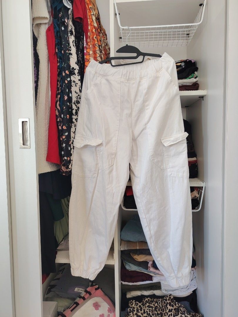 SHEIN White Cargo Jogger Pants (small on tag) (Category: Other Bottoms) located in Manila. Submitted by babeboxtheory (Listing ID 1461371168, Image 3). Description: - Stylish white cargo jogger pants - Comfortable elastic waistband with adjustable drawstring - Two convenient side pockets - Two functional cargo pockets on the legs - Trendy cuffed ankles - Perfect for everyday casual wear.