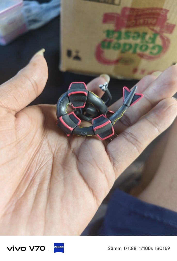 Shiny Rayquaza Pokémon Figure (Category: Figurines & Statues) located in Kapangan. Submitted by ClumZyDale (Listing ID 1468085006, Image 3). Description: - Shiny Rayquaza Pokémon mini figurine - Sleek black body with iconic red markings and yellow ring patterns - Features detailed head crest and tail fins - Ideal collectible for fans of the games and anime - Condition: Brand new / Great display piece.