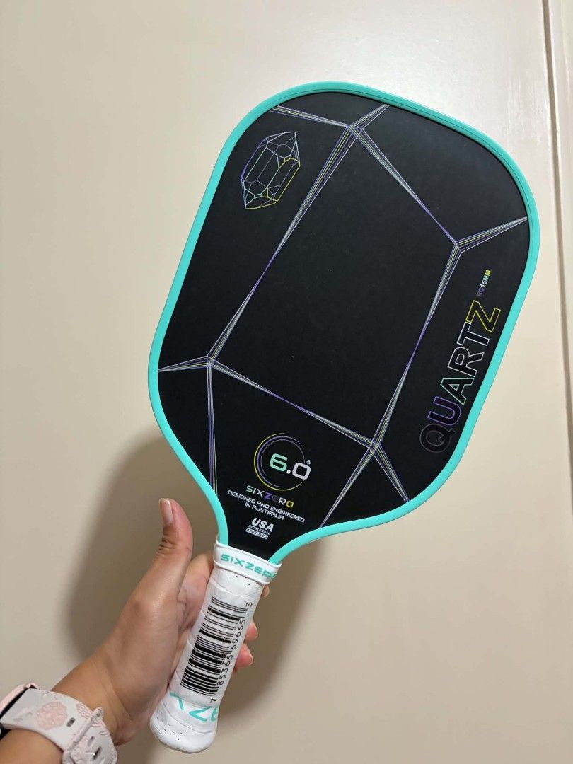 Six Zero Quartz 15MM Pickleball Paddle (Category: Racket and Ball Sports) located in Manila. Submitted by iamwencis (Listing ID 1468231227, Image 3). Description: 🏓 FOR SALE: Six Zero Quartz Prasiolite 💰 Price: ₱5,500 📦 Condition: Good as new 🗓️ Usage: 1 month only Freebies included: *Paddle cover *Transparent edge tape *Overgrip ✅ Edge tape installed since Day 1 ✅ Original plastic on the grip is still intact and has never been removed ✅ Well