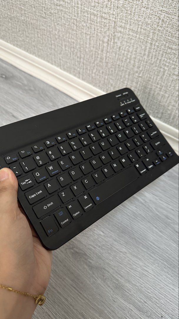 Slim Wireless Bluetooth Keyboard Black (Category: Computer Keyboard) located in Makati City. Submitted by glyzacatalan (Listing ID 1468085116, Image 1). Description: - Sleek black wireless keyboard compatible with tablets and phones - Compact QWERTY layout with handy multi-device shortcuts - Easy-to-use power switch and connect button located on the top right - Clear indicator lights for caps lock, charging status, and power - Lightweight and min