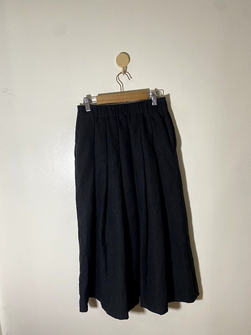 Small - GU A Line Pleated Skirt (Category: Skirts) located in Castillejos. Submitted by lalainecloset22 (Listing ID 1468184032, Image 3). Description: - Brand: GU (Uniqlo sister brand) - Style: A-Line Pleated Skirt - Size: S - Color: Classic Black - Material: 100% Polyester (lightweight and smooth) - Condition: Excellent, well-maintained - Versatile design perfect for casual outings, school, or preppy looks.