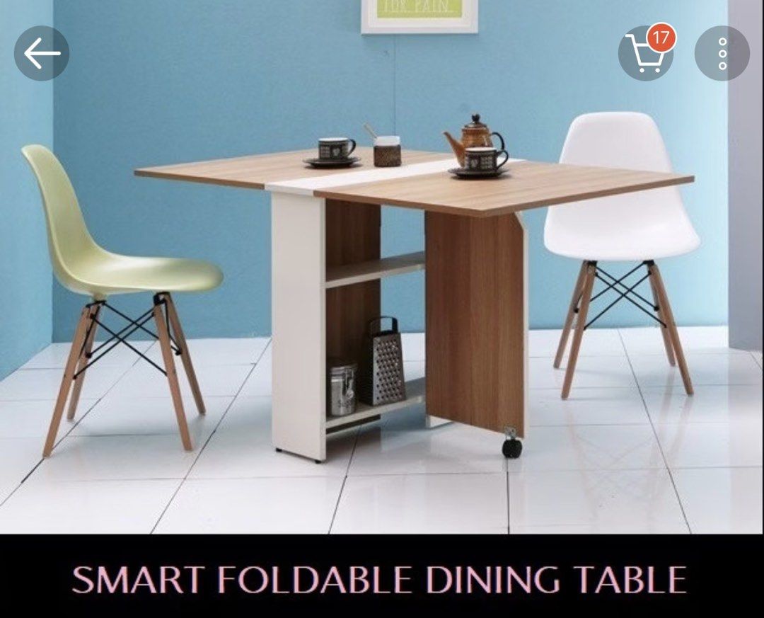 Smart Foldable Dining Table Extendable Kitchen Table (Category: Tables & Sets) located in Singapore. Submitted by rachel-sale (Listing ID 1468204921, Image 2). Description: - Space-saving foldable dining table with built-in storage shelves underneath - Easily transforms: fully closed console, half-opened, or fully open dining setup - Smooth rolling wheels for effortless mobility around the house - Stylish wooden tabletop finish with a clean white