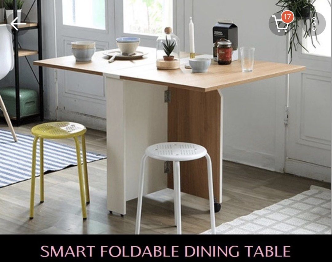 Smart Foldable Dining Table Extendable Kitchen Table (Category: Tables & Sets) located in Singapore. Submitted by rachel-sale (Listing ID 1468204921, Image 3). Description: - Space-saving foldable dining table with built-in storage shelves underneath - Easily transforms: fully closed console, half-opened, or fully open dining setup - Smooth rolling wheels for effortless mobility around the house - Stylish wooden tabletop finish with a clean white