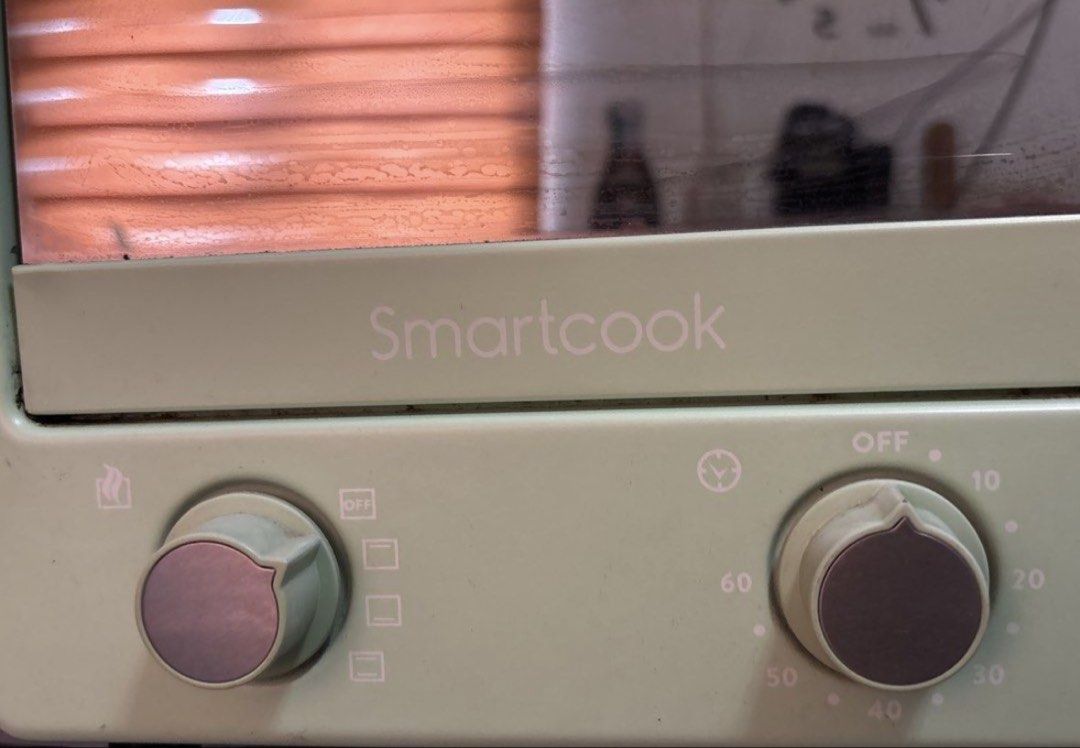 Smartcook Mint Green Oven Toaster (Category: Ovens & Toasters) located in Malabon City. Submitted by luxgoals (Listing ID 1468276015, Image 2). Description: - Brand: Smartcook - Color/Design: Mint green retro style - Controls: Dual control knobs for functions and timer up to 60 minutes - Inclusions: Wire rack and baking tray included - Perfect for small spaces and aesthetic kitchen setups.