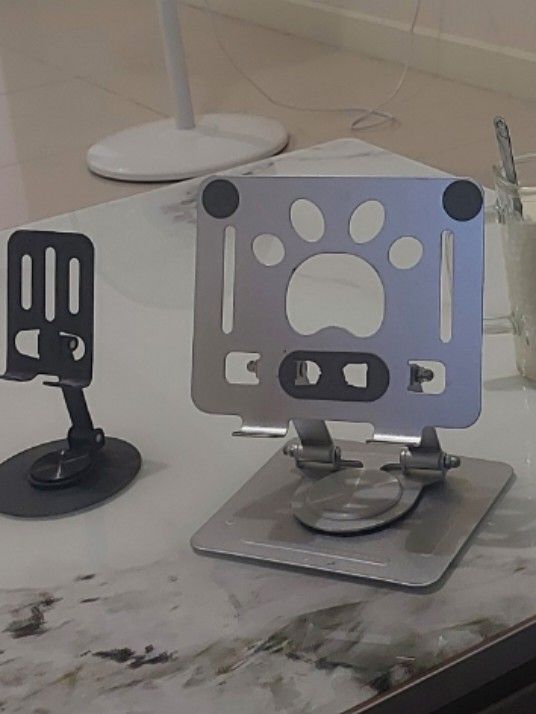 smartphone and tablet stands (Category: Mounts & Holders) located in Pasay City. Submitted by hellophilippines (Listing ID 1468098723, Image 1). Description: very solid. sturdy. holds the gadgets very well . both of them for 200pesos.