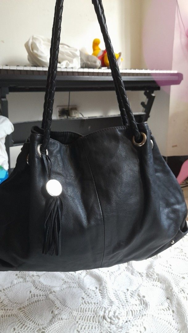 Soft Black Leather Hobo Bag with Braided Handles & Tassel (Category: Shoulder Bags) located in Manila. Submitted by jocelyn527 (Listing ID 1468106971, Image 2). Description: 🖤 Soft Black Leather Hobo Bag ✨ PERFECT FOR: 💼 Work & Office — Sleek and professional, elevates any outfit 🌙 Evening & Outings — Elegant yet effortless, perfect for dinners and events 👜 Everyday Carry — Soft, lightweight, and comfortable on the shoulder 🛍️ Casual Days — 