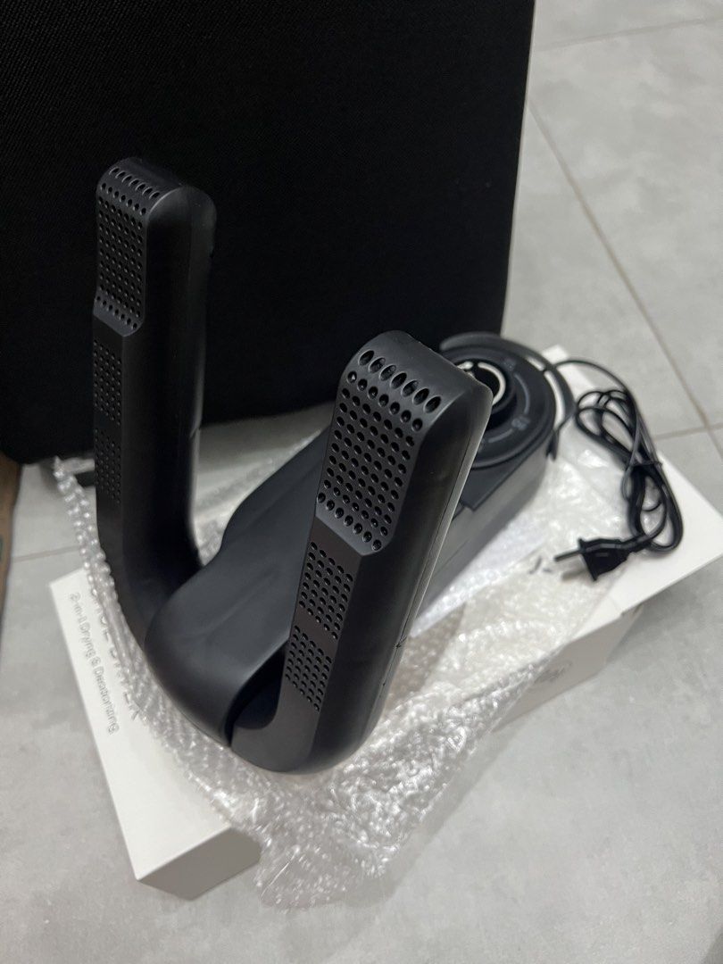 SOLEDRY Portable Shoe Dryer 2-in-1 Drying & Deodorizing (Category: Sanitizers & Disinfectants) located in Antipolo. Submitted by viadeclutters (Listing ID 1468213785, Image 3). Description: SOLEDRY portable shoe dryer and deodorizer in sleek black. Features 360-degree heat circulation, built-in UV sanitization, and a simple 30 to 120-minute timer knob. Compact with a carrying handle, 150W power, and safe 40°C-45°C heating. Never used..