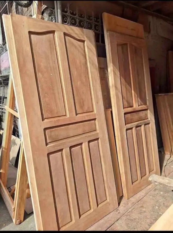 SOLID PANEL DOOR MAHOGANY (Category: Locks, Doors & Gates) located in Quezon City. Submitted by anglerose070187 (Listing ID 1468130481, Image 1). Description: - Direct from workshop: Handcrafted solid wood doors with heavy-duty construction - Customizable: Multiple panel designs available to match your home - Unfinished natural timber: Ready for sanding, staining, or painting to your preference - Sizes and styles: Message us to check current avai