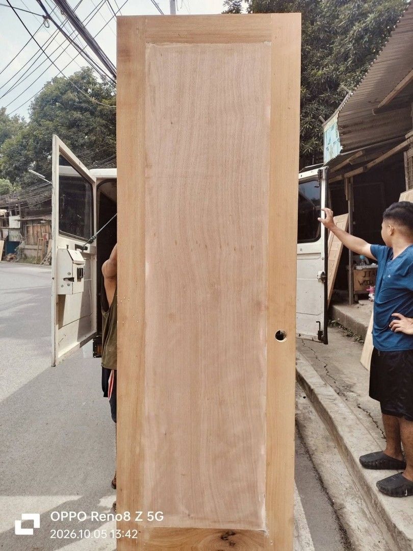 SOLID PANEL DOOR MAHOGANY (Category: Locks, Doors & Gates) located in Quezon City. Submitted by anglerose070187 (Listing ID 1468130481, Image 2). Description: - Direct from workshop: Handcrafted solid wood doors with heavy-duty construction - Customizable: Multiple panel designs available to match your home - Unfinished natural timber: Ready for sanding, staining, or painting to your preference - Sizes and styles: Message us to check current avai