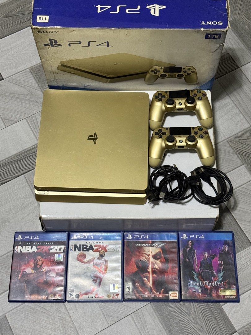 Sony PlayStation 4 Slim 1TB Gold Bundle with Games (Category: PlayStation) located in Malabon City. Submitted by mangwelsss (Listing ID 1468229017, Image 1). Description: PlayStation 4 Slim 1TB (Gold Edition) Complete with box Ps4 Console 1TB 2 Original Dualshock 4 (Gold) 1 Power Cable 1 HDMI Cable With 4 physical disc No issue No history repair Rfs: Mag upgrade na! For pick up only, check to sawa bago bayaran..
