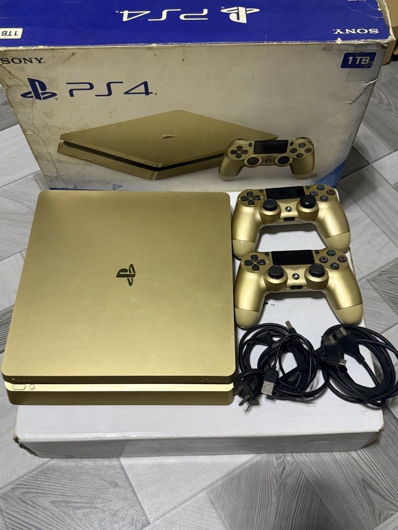 Sony PlayStation 4 Slim 1TB Gold Bundle with Games (Category: PlayStation) located in Malabon City. Submitted by mangwelsss (Listing ID 1468229017, Image 3). Description: PlayStation 4 Slim 1TB (Gold Edition) Complete with box Ps4 Console 1TB 2 Original Dualshock 4 (Gold) 1 Power Cable 1 HDMI Cable With 4 physical disc No issue No history repair Rfs: Mag upgrade na! For pick up only, check to sawa bago bayaran..