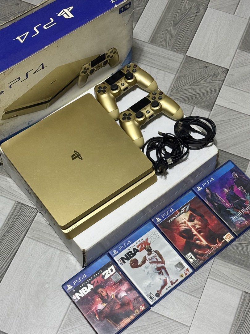 Sony PlayStation 4 Slim 1TB Gold Bundle with Games (Category: PlayStation) located in Malabon City. Submitted by mangwelsss (Listing ID 1468229017, Image 2). Description: PlayStation 4 Slim 1TB (Gold Edition) Complete with box Ps4 Console 1TB 2 Original Dualshock 4 (Gold) 1 Power Cable 1 HDMI Cable With 4 physical disc No issue No history repair Rfs: Mag upgrade na! For pick up only, check to sawa bago bayaran..