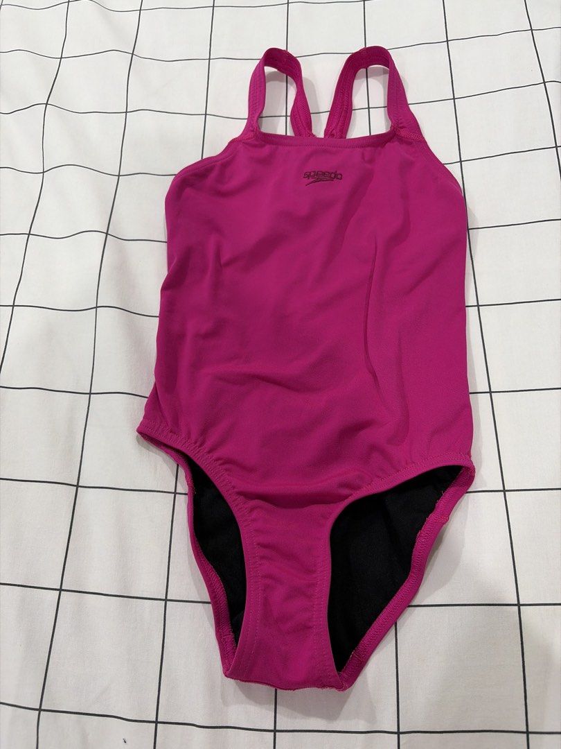 Speedo Endurance Pink One-Piece Swimsuit (Category: Babies & Kids Fashion) located in Manila. Submitted by handmdown (Listing ID 1468189143, Image 1). Description: - Brand: Speedo - Color: Bright pink with black lining - Material: Chlorine-resistant Speedo Endurance fabric - Design: Thin double straps with a stylish keyhole cutout at the back - Details: Speedo logo on the chest and Endurance text on the lower back - Best for: Lap swimming and tra