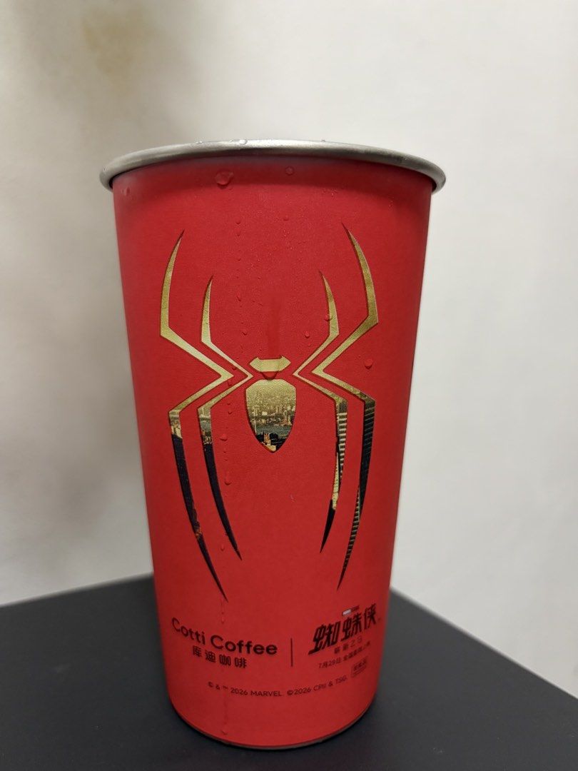 Spiderman Color Changing Cup 700 ml (Category: Water Bottles & Tumblers) located in Valenzuela. Submitted by nextdoor_finds (Listing ID 1468234881, Image 2). Description: - Official Marvel x Cotti Coffee Spider-Man merchandise - Unique reversible design featuring red and white colorways - Spider graphic with a city skyline silhouette cutout inside - Premium metal rim at the top - Features Cotti Coffee branding and copyright text at the base - Gre