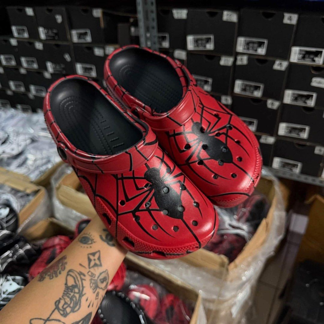 Spiderman Red Crocs (Category: Slippers & Slides) located in Mandaluyong City. Submitted by droptillushop (Listing ID 1468105382, Image 1). Description: With ecobag Size 36-44 Standard Sizing.