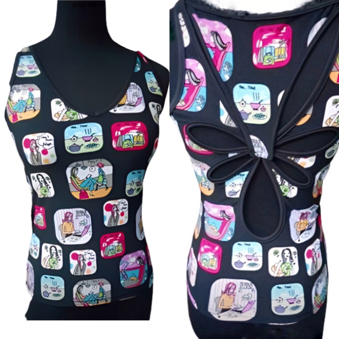 BLACK CARTOON GYM TOP (Category: Sleeveless) located in Marikina City. Submitted by minimalistmanila (Listing ID 1468145481, Image 2). Description: New black top with cartoon design. Bought in USA. Fits small to semi med. Stretchy. Good for the beach or gym. Order now! .