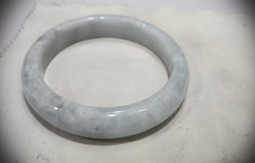 Spring Color Burmese Jadeite Bangle 57.5mm (Category: Bracelets) located in Baguio. Submitted by lausgem2026 (Listing ID 1468134204, Image 1). Description: -Spring color (has half green and half purple) Burmese Jadeite Bangle -Grade A (natural and untreated) -57.5mm diameter size. 12.7mm thickness. -Comes with free box and free certificate. -Note: The color is light and the half-half color can be better seen in person. (Picture 5: The 2nd bangle 