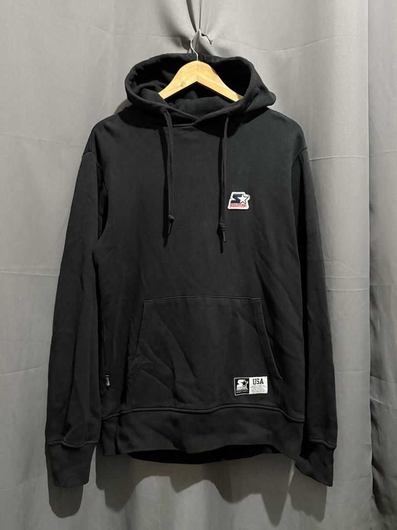 Starter Black Label USA Logo Hoodie (Category: Hoodies) located in Santo Tomas. Submitted by miguelhussle (Listing ID 1468059643, Image 1). Description: - Brand: Starter Black Label - 28 L x 22 W - 9.3/10 Colorrate - Color: Black - Size: Medium (Regular Fit) - Material: 100% Cotton - Details: Embroidered chest and pocket logo patches, drawstring hood, front kangaroo pocket, and side seam woven tag - Condition: Clean interior tags, made in China -