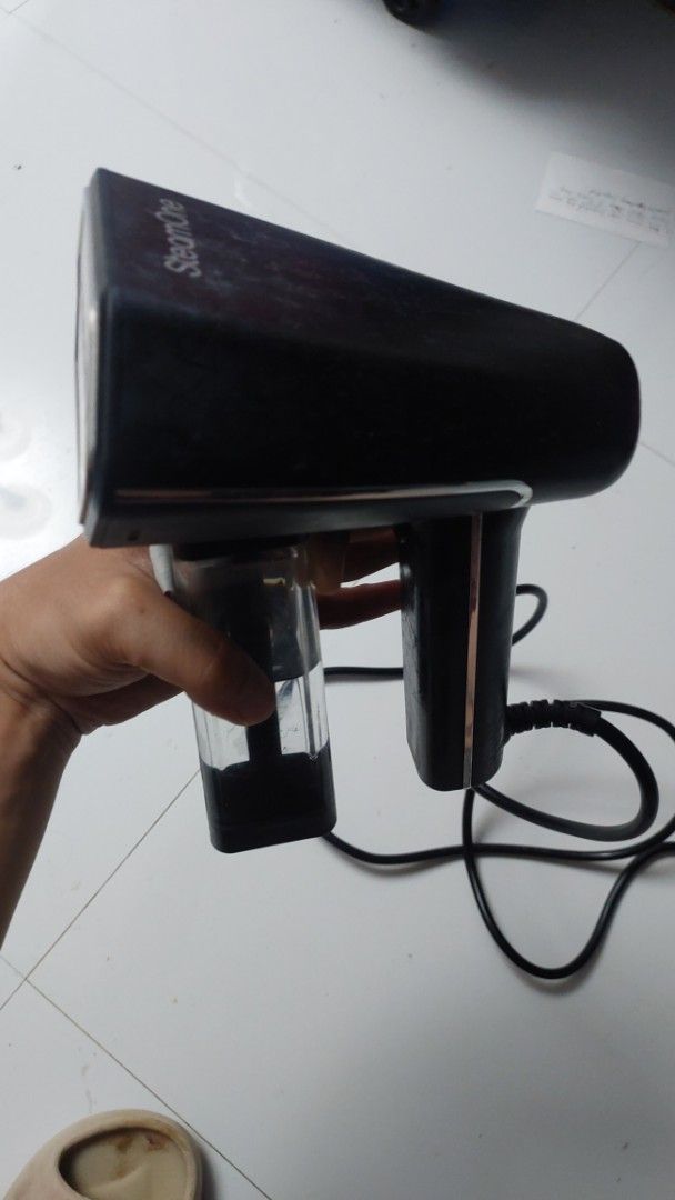 SteamOne S-Nomad Handheld Garment Steamer (Category: Irons & Steamers) located in Las Pinas. Submitted by pureearth.0bb746 (Listing ID 1468075240, Image 3). Description: - Model: SteamOne S-Nomad Handheld Garment Steamer - Color: Sleek black design, compact and travel-friendly - Water Tank: 150ml capacity with a handy universal bottle connector for endless water supply - Performance: Fast heat-up time for quick and easy clothes touch-ups - Usage: