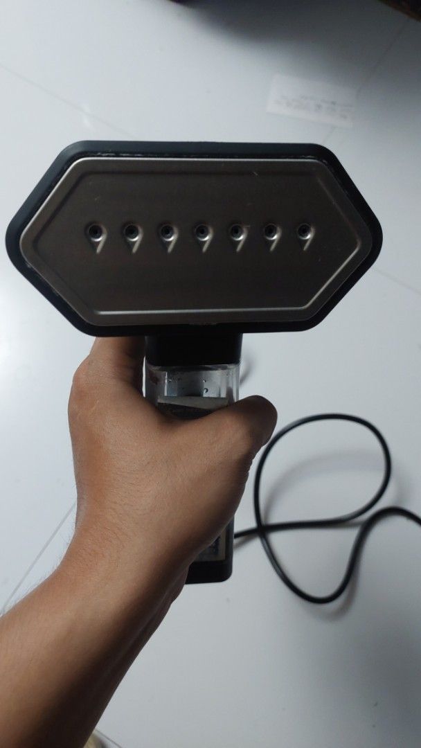 SteamOne S-Nomad Handheld Garment Steamer (Category: Irons & Steamers) located in Las Pinas. Submitted by pureearth.0bb746 (Listing ID 1468075240, Image 2). Description: - Model: SteamOne S-Nomad Handheld Garment Steamer - Color: Sleek black design, compact and travel-friendly - Water Tank: 150ml capacity with a handy universal bottle connector for endless water supply - Performance: Fast heat-up time for quick and easy clothes touch-ups - Usage: