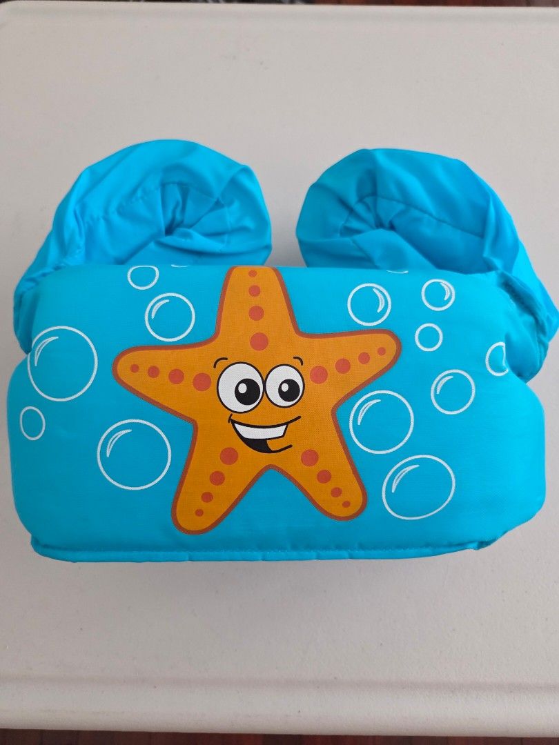 Stearns Puddle Jumper Child Floatation Vest Starfish Blue (Category: Babies & Kids Fashion) located in Quezon City. Submitted by robin.t (Listing ID 1468091335, Image 1). Description: - Authentic Stearns Puddle Jumper life jacket - Ideal for kids weighing 30 to 50 lbs - Bright blue with cute starfish graphic - Secure, adjustable back strap with quick-release buckle - Perfect swim aid for pool days and beach trips - Clean and well-maintained condi