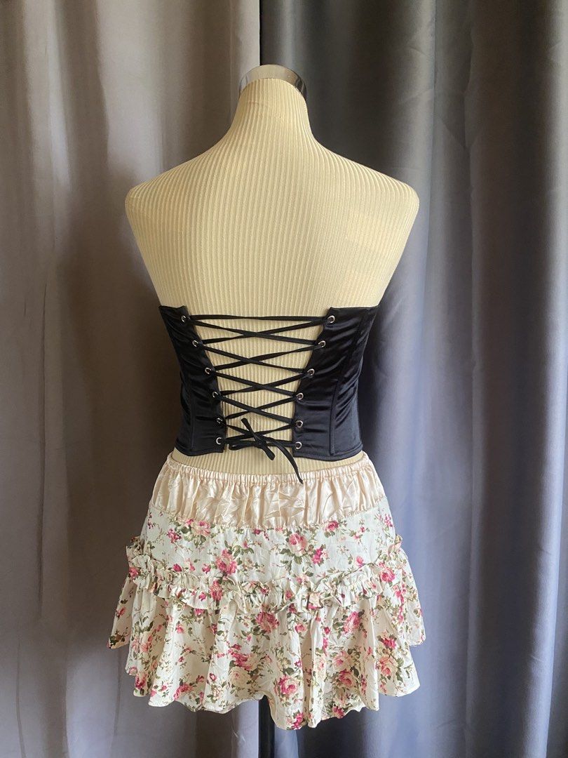 Glassons Strapless Satin Hook and Lace Up Corset Top (Category: Sleeveless) located in Cagayan de Oro. Submitted by curated_closetph (Listing ID 1468192855, Image 3). Description: —Size: XS - S — Color: Black — Smooth satin fabric with a subtle sheen — Strapless tube neckline — Front hook-and-eye closure — Adjustable lace-up ribbon back with metal grommets — Structured boning for waist shaping — Straight cropped hemline for versatile styling — Ca