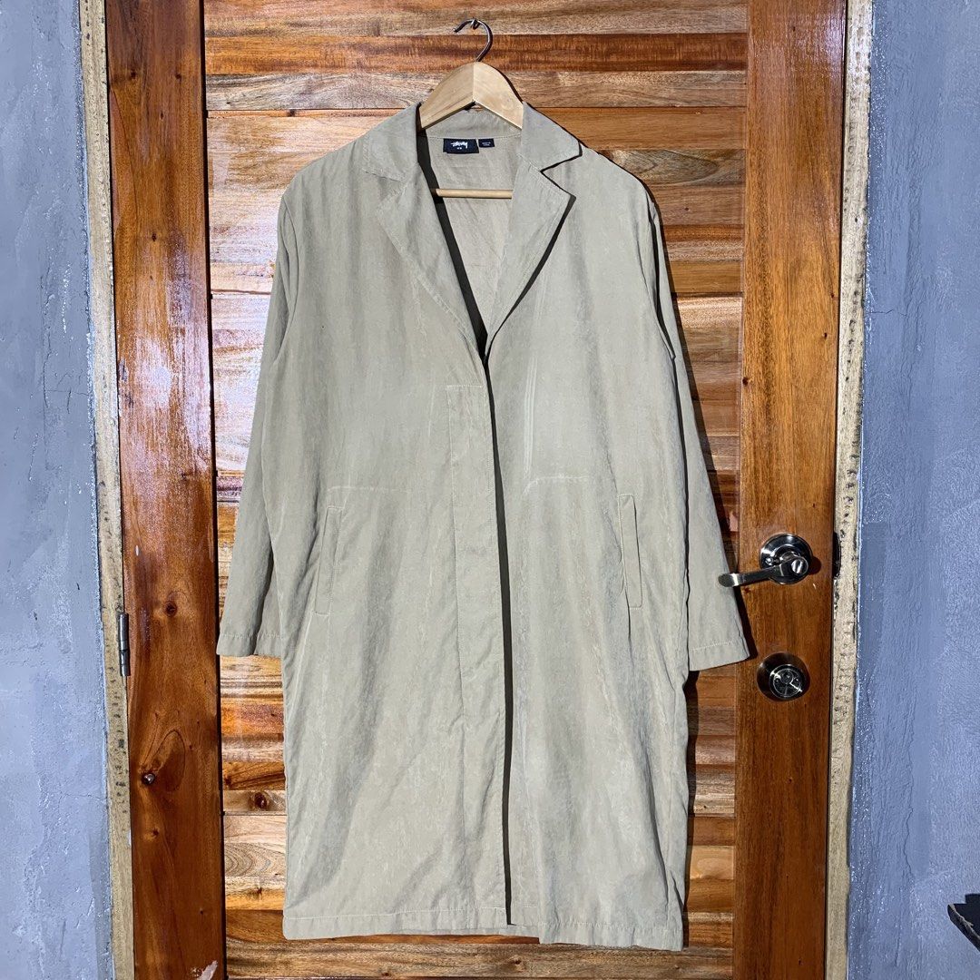 Stussy Long Coat Jacket (Category: Coats, Jackets and Outerwear) located in Andop. Submitted by rhouzze.ph24 (Listing ID 1468145672, Image 1). Description: OPEN FOR NEGOTIATION Name: Stussy Dimensions: 24 by 40 Size: Issue: Small stain, refer to the photos for details .