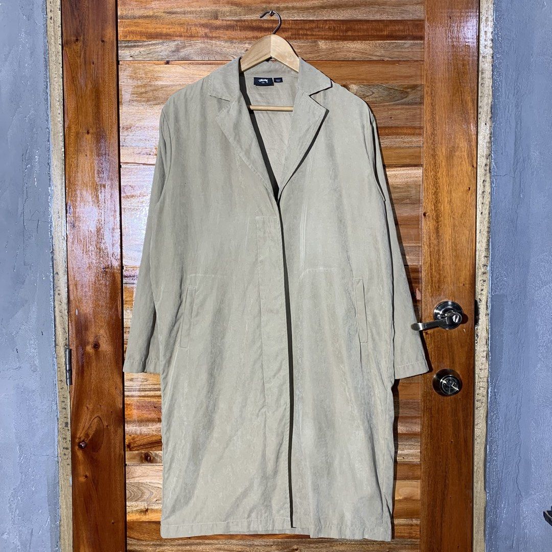 Stussy Long Coat Jacket (Category: Coats, Jackets and Outerwear) located in Andop. Submitted by rhouzze.ph24 (Listing ID 1468145672, Image 2). Description: OPEN FOR NEGOTIATION Name: Stussy Dimensions: 24 by 40 Size: Issue: Small stain, refer to the photos for details .