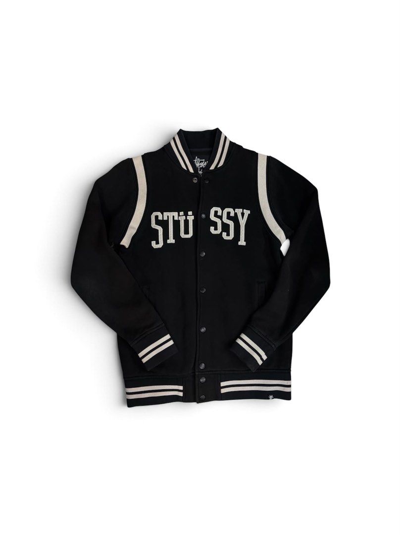 Stussy Varsity Jacket Black Size Small (Category: Coats, Jackets and Outerwear) located in Davao. Submitted by erwin_james (Listing ID 1468175454, Image 1). Description: - Brand: Stussy - Item: Varsity Jacket - Color: Black with cream chenille lettering - Size: Small - Material: 80% cotton, 20% acrylic - Features: Button-up front, striped ribbed collar/cuffs/hem, and side crown logo tag - Origin: Made in China -20x27.
