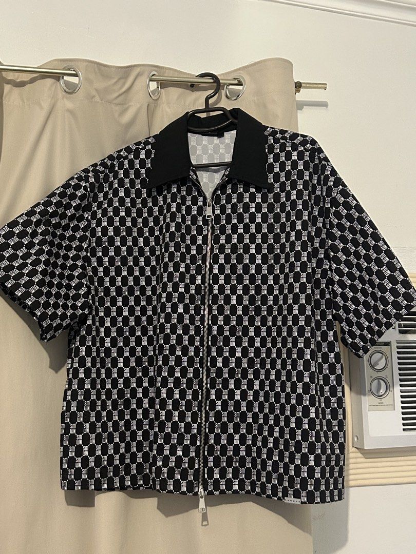 Sumwon Black White Monogram Zip Short Sleeve BOXY FIT (Category: Tshirts & Polo Shirts ) located in Dasmarinas. Submitted by brandedstuff.est2022 (Listing ID 1468170640, Image 1). Description: - Brand: Sumwon - Style: Short sleeve shirt with black & white monogram pattern - Closure: Full front zipper with silver hardware - Collar: Solid black lapel collar - Size: Medium (tag attached) - Condition: Clean stitching, lightweight, and comfortable fab