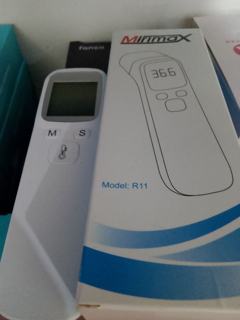 Sunphor Mirimax R11 Infrared Thermometer With Box (Category: Thermometers) located in Davao. Submitted by luckyturtle.aa6ccf (Listing ID 1468175607, Image 2). Description: - Model: Sunphor Mirimax R11 infrared thermometer - Clear digital display screen on the front - Battery-operated design for easy, portable use - Ideal for quick temperature checks at home or in the office - Includes original white and blue packaging box (with minor wear from st