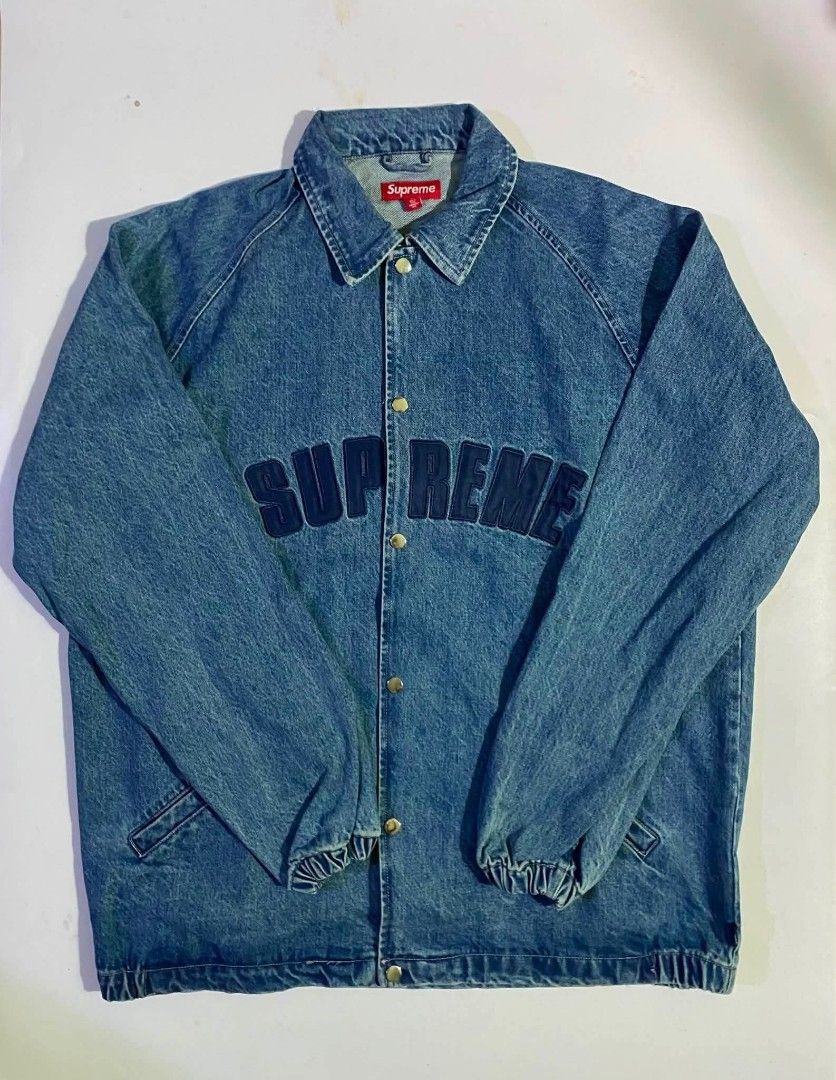 Supreme Denim Coach Jacket Blue Size L (Category: Coats, Jackets and Outerwear) located in San Juan City. Submitted by findmorelux (Listing ID 1467786453, Image 1). Description: - Brand: Supreme - Item: Denim Coach Jacket - Color: Blue wash with dark navy embroidered chest branding - Size: Large (L) - Material: 100% Cotton - Features: Snap button front, collared neckline, elasticized cuffs and hem, red box logo tag - Condition: Brand new / Excell