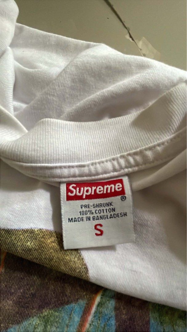 Supreme Undercover Lupin The Third Tee White Small (Category: Tshirts & Polo Shirts ) located in Calauan. Submitted by thrift_joms (Listing ID 1468197315, Image 3). Description: - Brand: Supreme x Undercover - Year: 2023 - Color: White - Size: Small - Design: Lupin III graphic print with puppet strings on the front - Material: 100% cotton with original neck and interior wash tags.