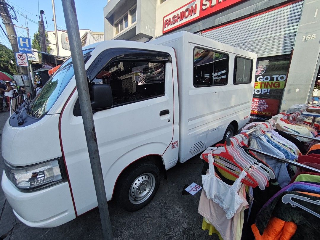 Suzuki Carry UV Manual (Category: Used Cars) located in Manila. Submitted by zealdragon.e46f60 (Listing ID 1468168671, Image 3). Description: QUICK SPECS: Transmission: Manual (MT) Engine: 1.5L Gas (Very healthy, smooth drive) Body: FB Utility Van with sliding windows Status: Private use / Not For Hire CONCESSIONS (See Photos): Cracked right headlight lens (bulb works, needs new headlight lens) Minor dent with paint chip on side panel Shallow scr
