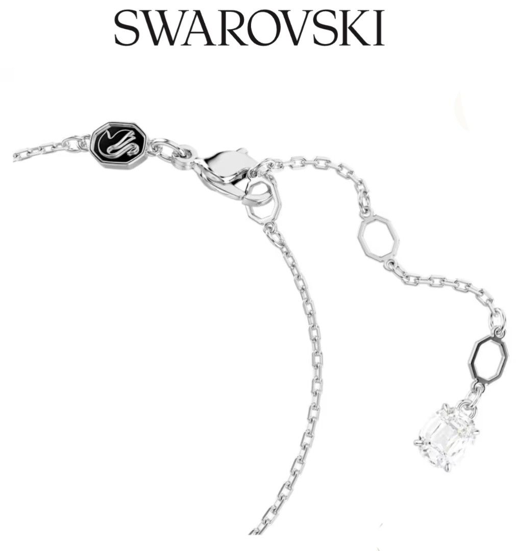 Swarovski Nice Feather Blue Crystal Silver Bracelet (Category: Bracelets) located in Bacoor. Submitted by ourpersonalstuffs (Listing ID 1468065303, Image 2). Description: Swarovski bracelet with a detailed feather centerpiece, pavé crystals, and a deep blue stone. Rhodium plated finish. Adjustable chain featuring a dangling crystal charm at the end and the iconic Swarovski swan tag near the lobster clasp. Delicate look on the wrist, catches the l