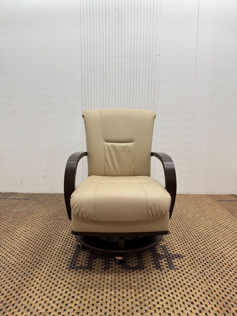 Swivel chair (Category: Chairs) located in Quezon City. Submitted by matetdevis13 (Listing ID 1468085462, Image 1). Description: Beige Upholstered Swivel Lounge Chair with Wooden Armrests Price: 4,900 L23.5 x W25 x H33/15.5 In good condition Code MJS20-RP73.