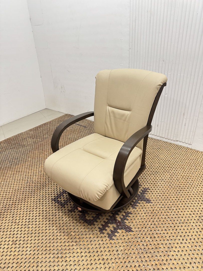 Swivel chair (Category: Chairs) located in Quezon City. Submitted by matetdevis13 (Listing ID 1468085462, Image 3). Description: Beige Upholstered Swivel Lounge Chair with Wooden Armrests Price: 4,900 L23.5 x W25 x H33/15.5 In good condition Code MJS20-RP73.